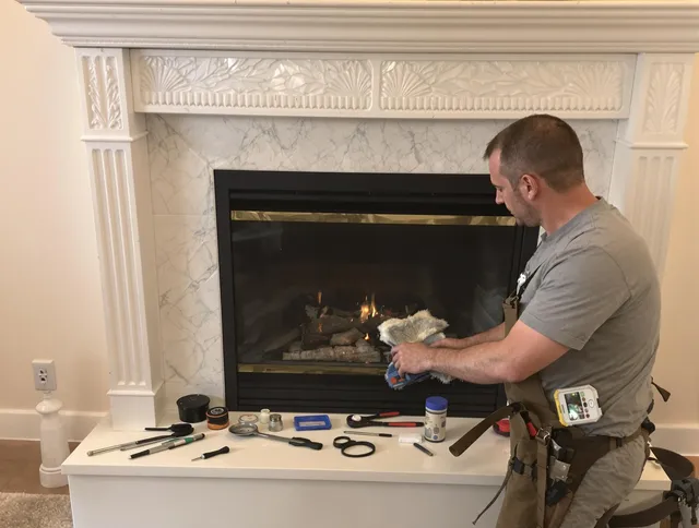 Rocky Hill Chimney Sweep performing fireplace maintenance in Rocky Hill, CT